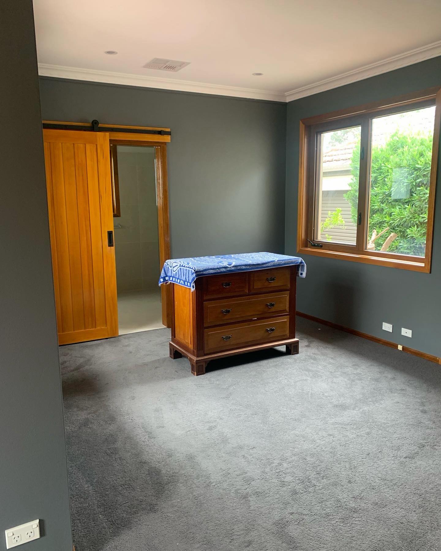 Finished bedroom with freshly painted walls